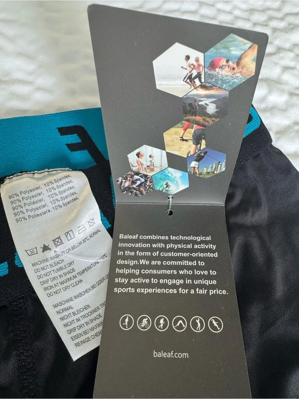 Baleaf Men’s Black Athletic Shorts with Teal Trim
